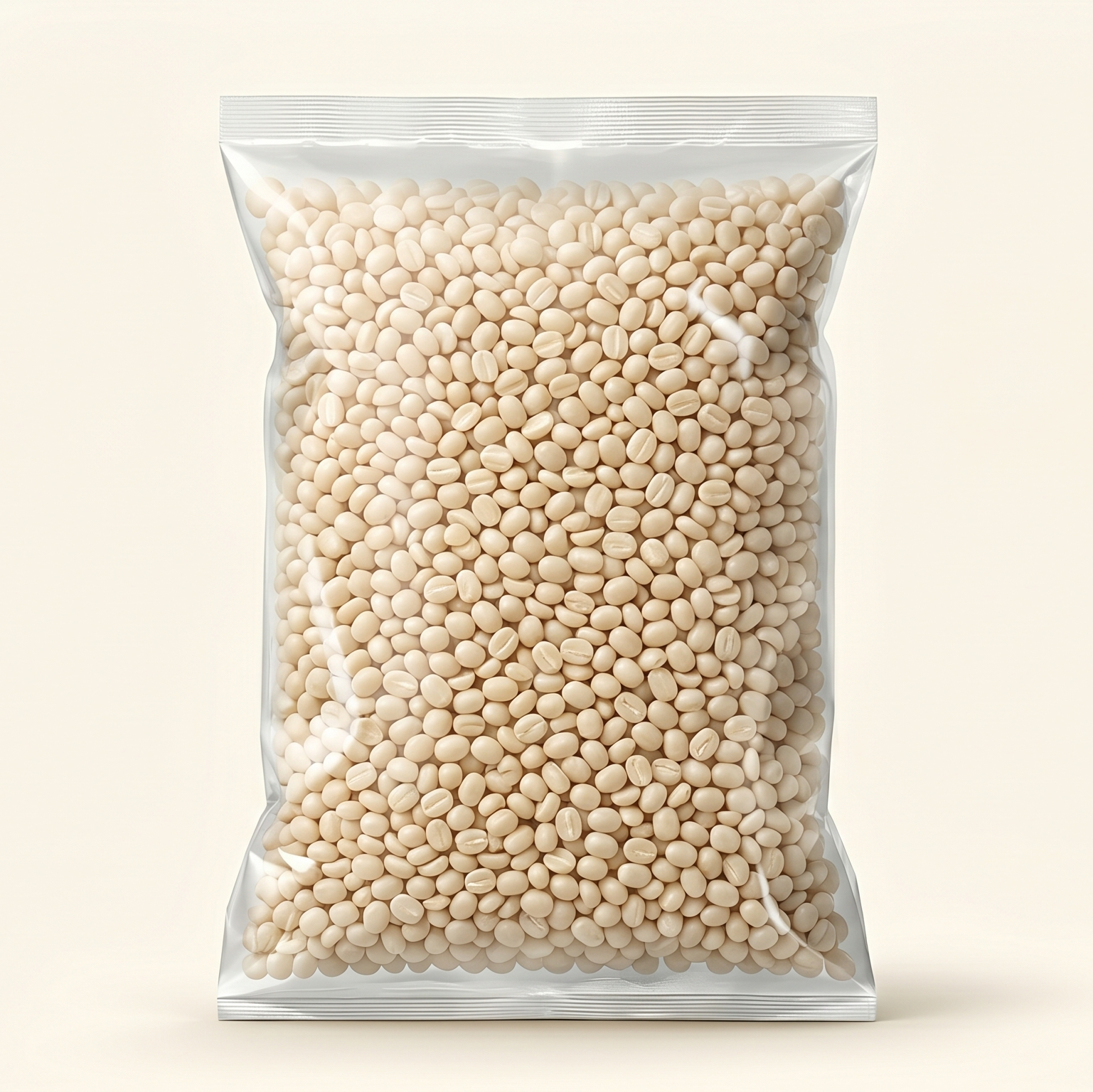 Clear plastic bag filled with white Urud dal on a light beige background