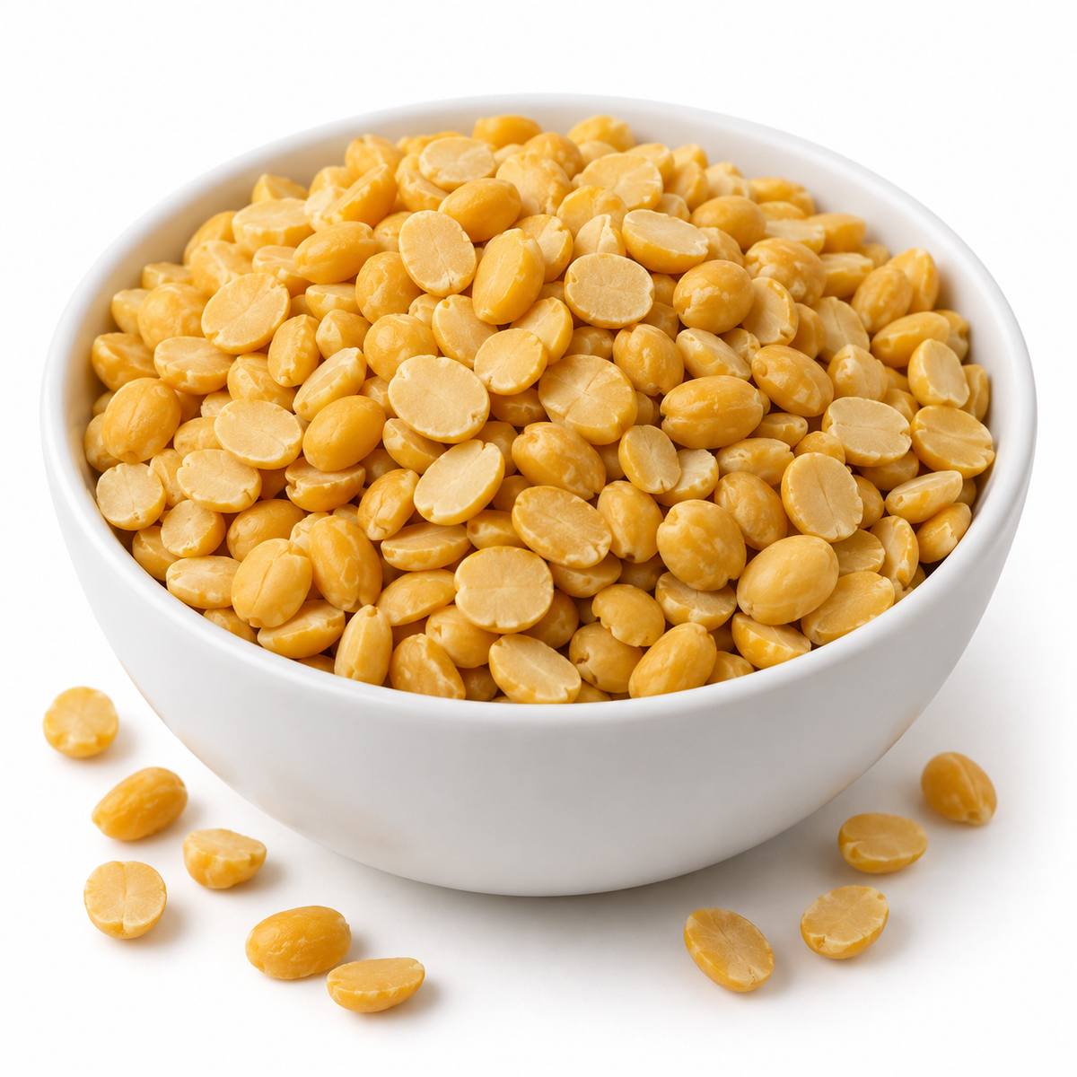 Illustrative image of dry yellow split pigeon peas (toor dal) in a white bowl